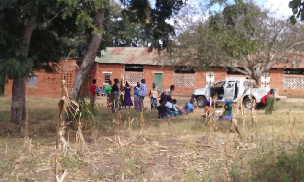 3D4AGDEV group in Kabudula, Lilongwe District relaxing in the shade of a tree.